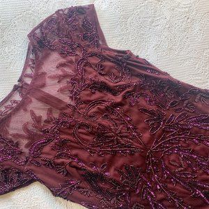 Beaded plum wine evening gown